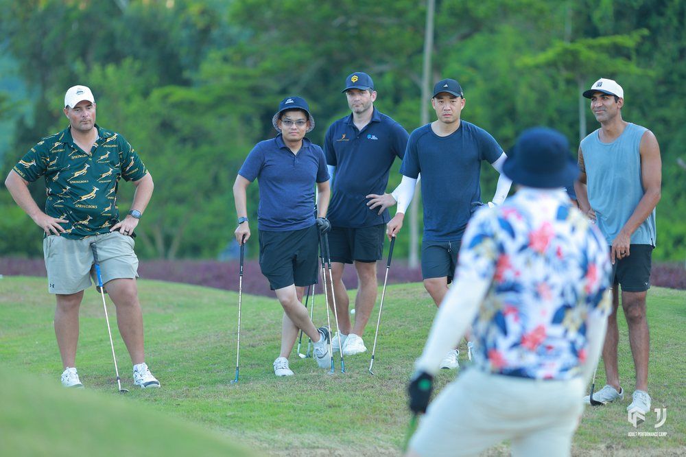 Players on the range between drills