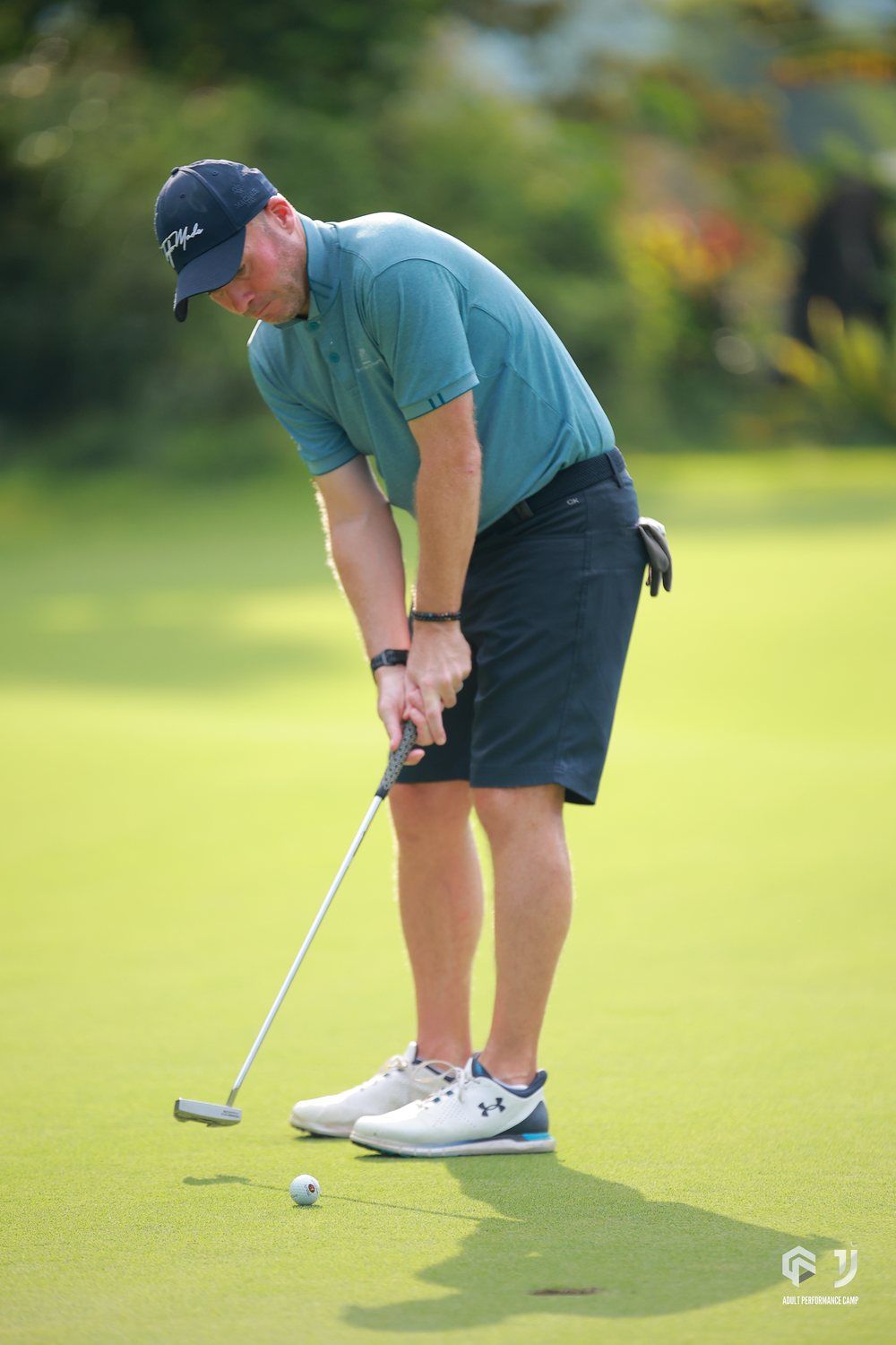 A player lining up a putt